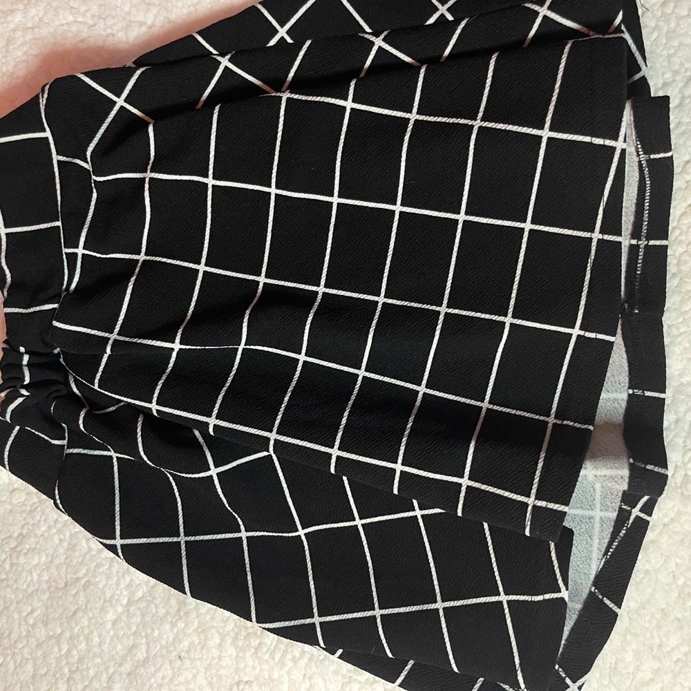 Black and White Grid Skirt with Flowing Design